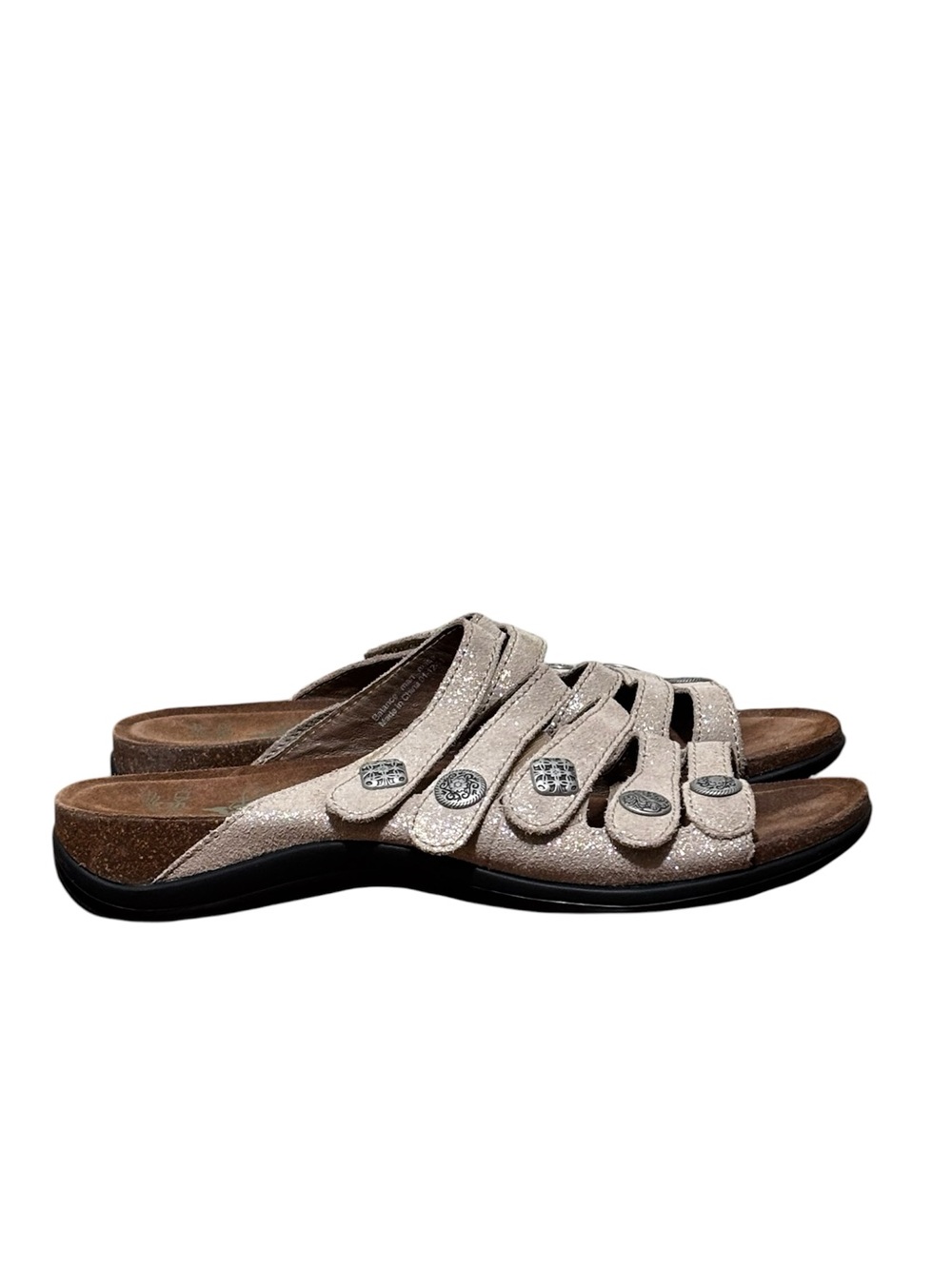 Dansko Janie Sandals in a shimmery taupe  featuring decorative hardware. Size 41